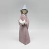 Nao Girl Holding Turtle Dove Figurine