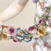 Meissen Figurine Of A Lady Holding A String Of Flowers