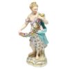 Meissen Figurine Of A Lady Holding A String Of Flowers