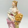 Meissen Figurine Of A Lady Holding Wheat