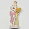 Meissen Figurine Of A Lady Holding Wheat