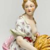Meissen Figurine Of A Lady Holding Wheat