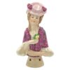 Porcelain Glazed 20th Century Half Doll Holding Yellow Flower