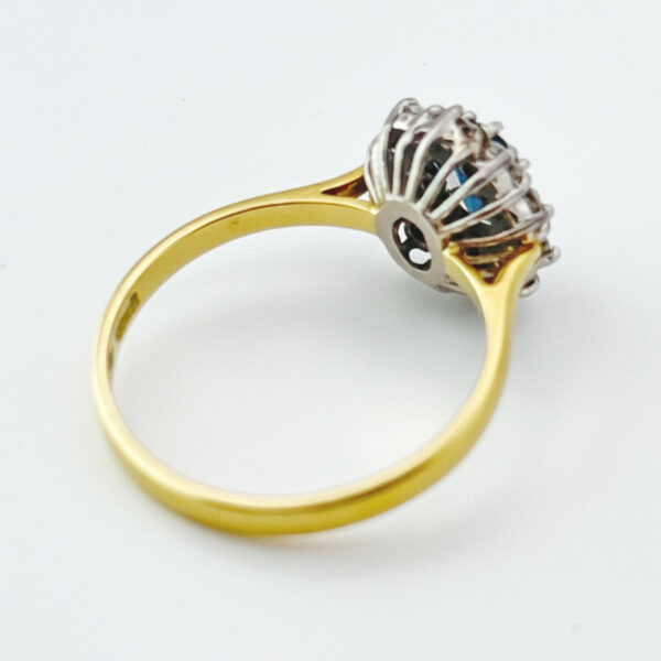18ct Gold Sapphire And Diamond Halo Ring