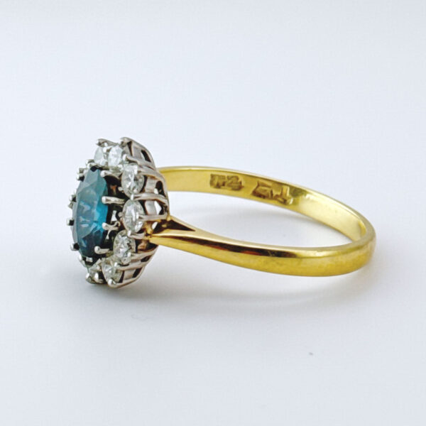 18ct Gold Sapphire And Diamond Halo Ring
