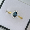 18ct Gold Sapphire And Diamond Halo Ring