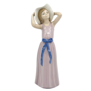 Lladro Figurine Girl Trying On A Hat
