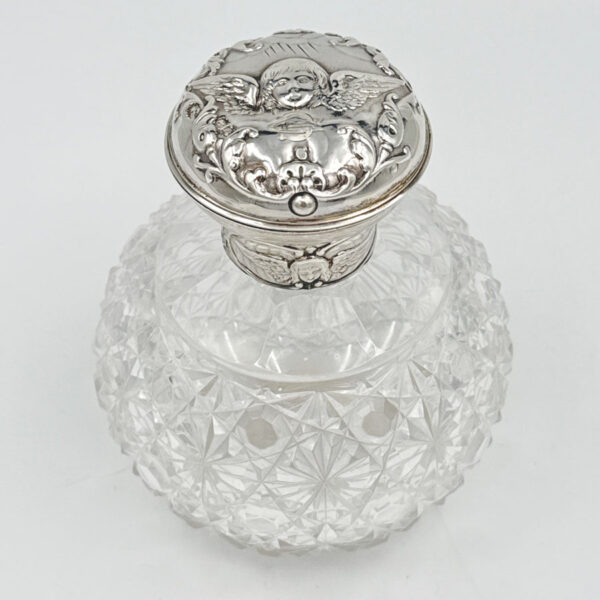 Silver Topped Angel Embossed Perfume Bottle London 1897 William Comyns