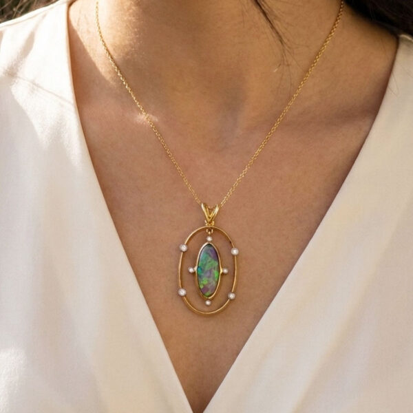 18ct Gold Black Opal And Diamond Pendant